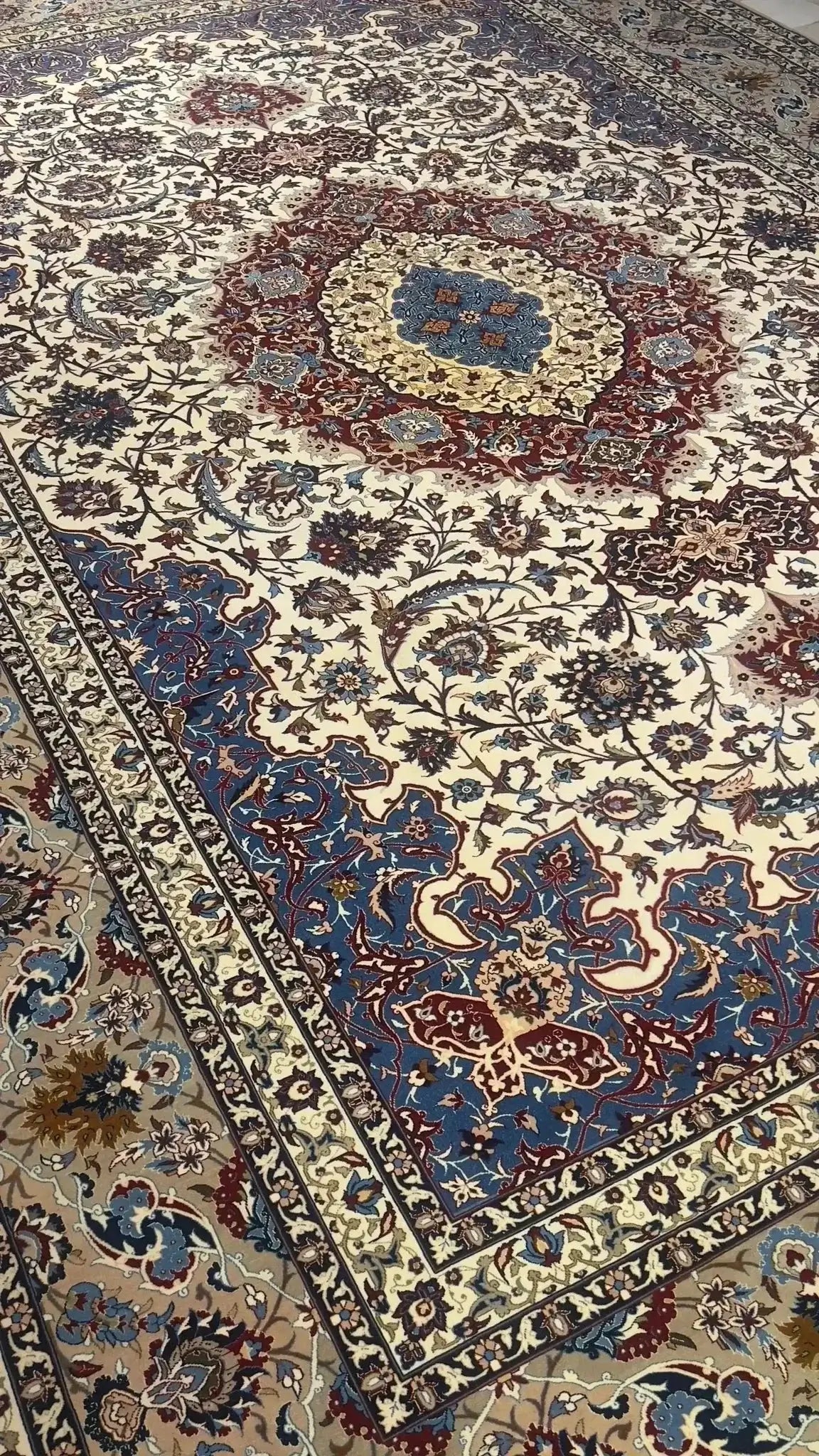"Detailed border design on Isfahan Persian rug by Master Zolfagharie."